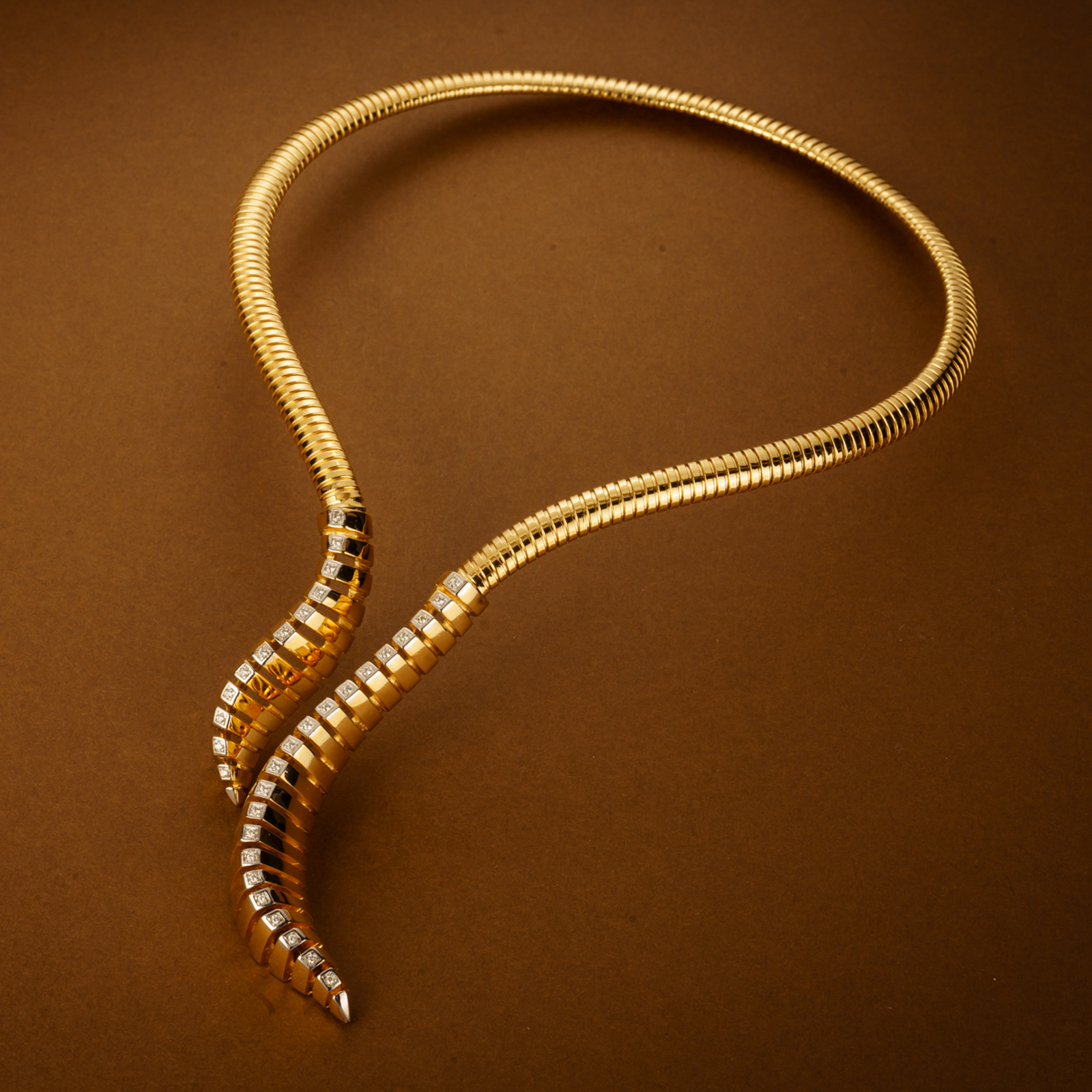 Collana in maglia tubogas stilizzata di serpente e zirconi